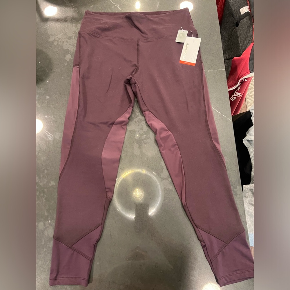 NWT plum Marika leggings, sheer panels on front and back